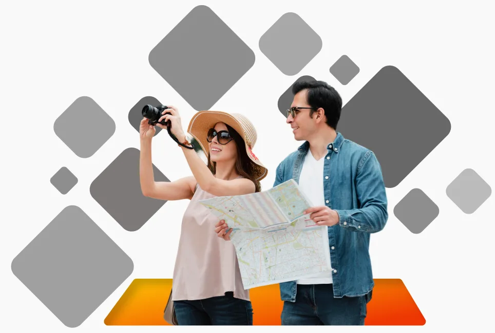 Two travellers with a map and camera exploring together